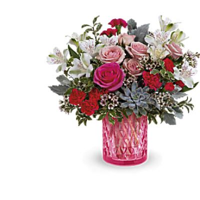 Make your feelings crystal clear this Valentine's Day with this beautiful Sweet Crystal pink rose bouquet presented in a sophisticated pink glass vase with delicate diamond pattern.