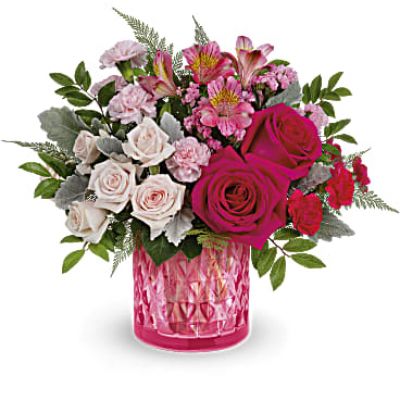 Take their breath away with this stylish pink rose bouquet, presented in an artisanal mosaic vase of stained glass that swirls in stunning shades of pink.